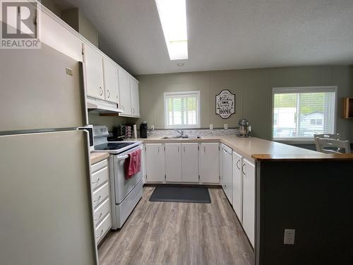 27 3889 Muller Avenue, Terrace, BC - Indoor Photo Showing Kitchen With Double Sink