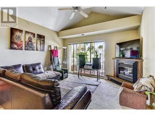 1007 Harvey Avenue Unit# 404, Kelowna, BC - Indoor Photo Showing Living Room With Fireplace