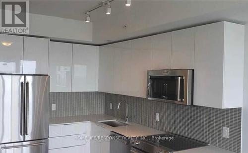 4709 - 30 Shore Breeze Drive, Toronto, ON - Indoor Photo Showing Kitchen With Upgraded Kitchen