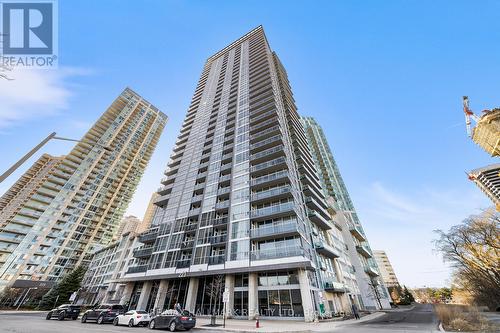 201 - 223 Webb Drive, Mississauga, ON - Outdoor With Balcony With Facade