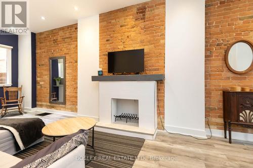 108 Seaton Street, Toronto, ON - Indoor With Fireplace