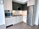 425 - 1 Belsize Drive, Toronto, ON  - Indoor Photo Showing Kitchen With Stainless Steel Kitchen With Upgraded Kitchen 