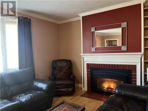 102 Whitney Avenue, Espanola, ON - Indoor Photo Showing Living Room With Fireplace