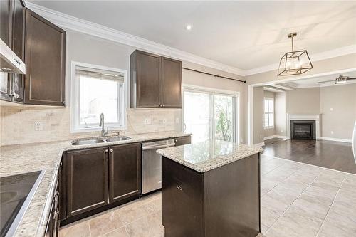 4756 Deforest Crescent, Burlington, ON - Indoor Photo Showing Kitchen With Fireplace With Double Sink