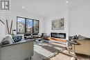 1109 9Th Street E, Saskatoon, SK  - Indoor Photo Showing Living Room With Fireplace 