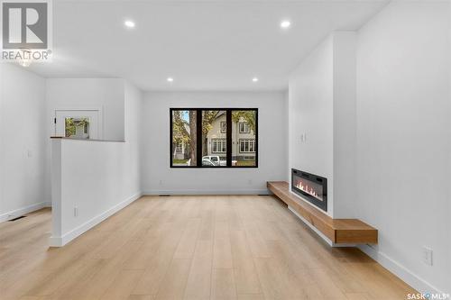 1109 9Th Street E, Saskatoon, SK - Indoor Photo Showing Living Room With Fireplace