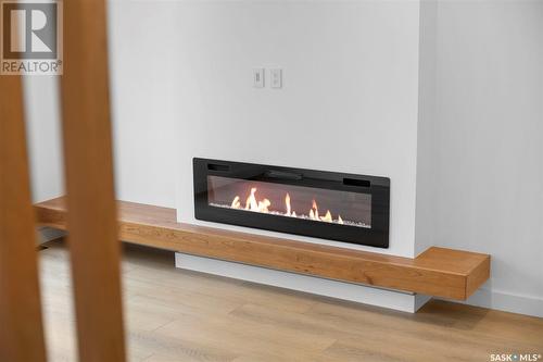 1109 9Th Street E, Saskatoon, SK - Indoor Photo Showing Living Room With Fireplace