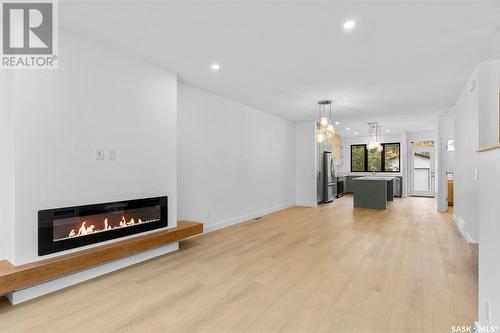 1109 9Th Street E, Saskatoon, SK - Indoor Photo Showing Living Room With Fireplace