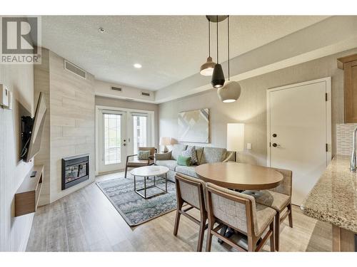 1200 Rancher Creek Road Unit# 103C, Osoyoos, BC - Indoor Photo Showing Living Room With Fireplace