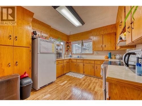 396 Whitevale Road, Lumby, BC - Indoor Photo Showing Kitchen With Double Sink