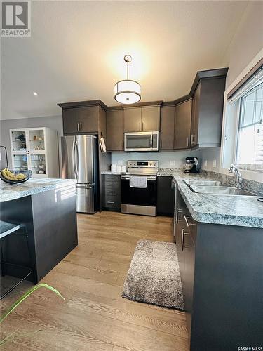 4165 Green Apple Drive E, Regina, SK - Indoor Photo Showing Kitchen With Double Sink With Upgraded Kitchen