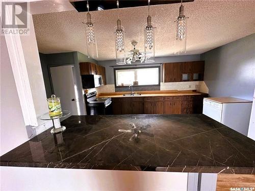 32 1St Avenue Nw, Preeceville, SK - Indoor Photo Showing Kitchen With Double Sink