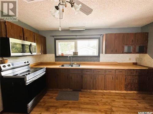 32 1St Avenue Nw, Preeceville, SK - Indoor Photo Showing Kitchen With Double Sink