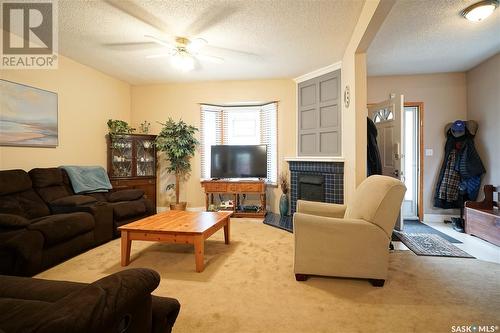 627 5Th Street E, Saskatoon, SK - Indoor Photo Showing Living Room With Fireplace