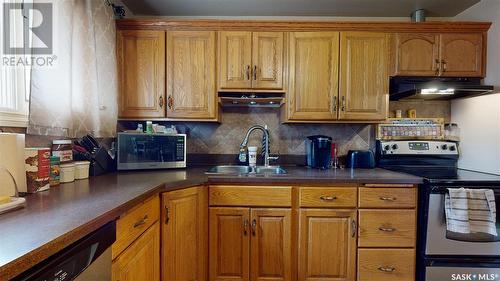 1334 Forget Street, Regina, SK - Indoor Photo Showing Kitchen With Double Sink