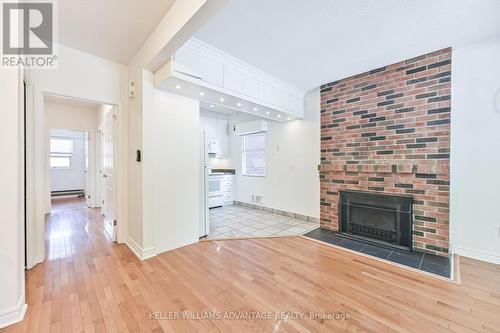 386/388 Rusholme Road, Toronto, ON - Indoor Photo Showing Living Room With Fireplace