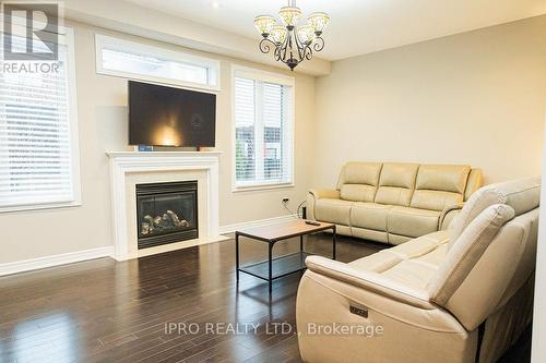 3339 Moses Way, Burlington, ON - Indoor Photo Showing Living Room With Fireplace