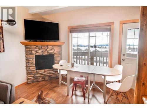 5020 Snowbird Way Unit# 9, Big White, BC - Indoor Photo Showing Dining Room With Fireplace