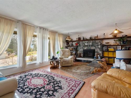 2363 Forest Drive, Blind Bay, BC - Indoor Photo Showing Living Room With Fireplace