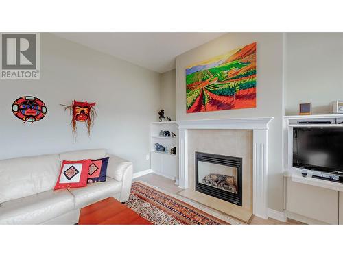 5820 89Th Street Unit# 303, Osoyoos, BC - Indoor Photo Showing Living Room With Fireplace