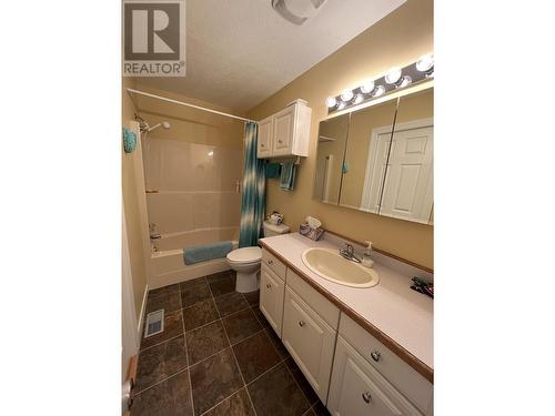 5504 Churchill Avenue, Fort Nelson, BC - Indoor Photo Showing Bathroom