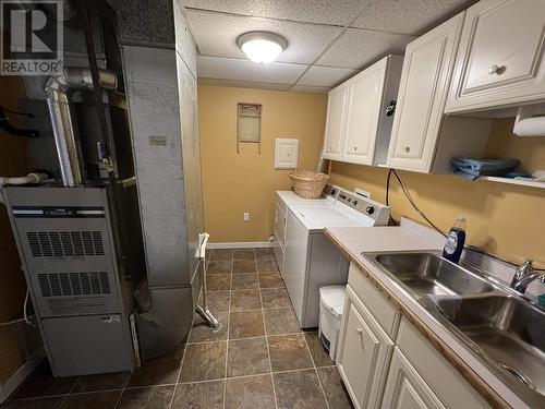 5504 Churchill Avenue, Fort Nelson, BC - Indoor Photo Showing Laundry Room