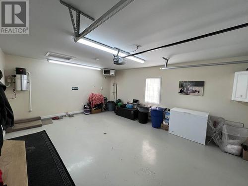5504 Churchill Avenue, Fort Nelson, BC - Indoor Photo Showing Garage