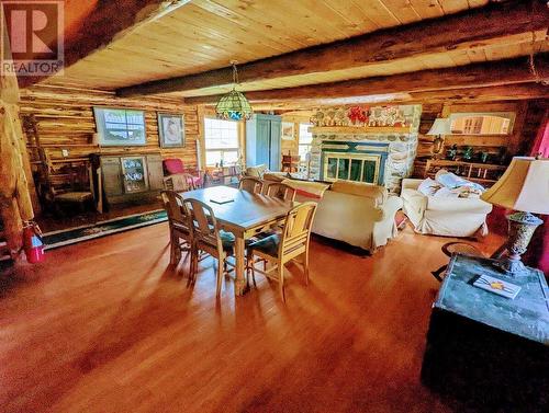 3513 Red Creek Road, Canim Lake, BC - Indoor Photo Showing Dining Room With Fireplace