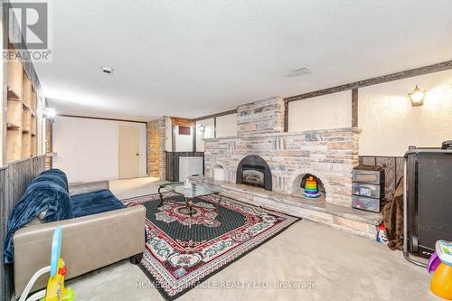 186 Wakefield Road, Milton, ON - Indoor Photo Showing Living Room With Fireplace