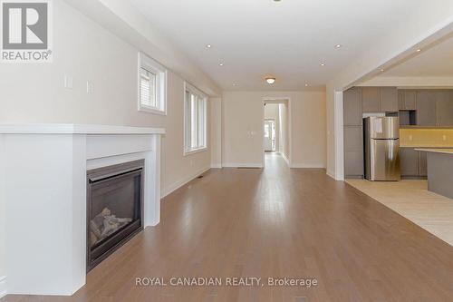 617 Fullum Landing, Milton, ON - Indoor Photo Showing Other Room With Fireplace