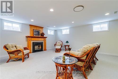 8143 Westminster Drive, Niagara Falls, ON - Indoor Photo Showing Basement With Fireplace