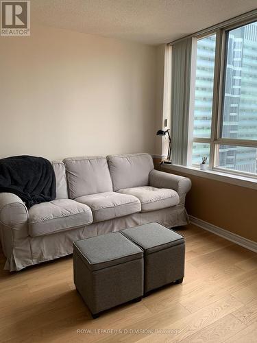 2402 - 633 Bay Street, Toronto, ON - Indoor Photo Showing Living Room