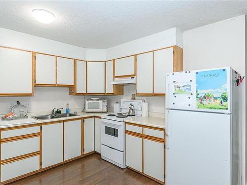 1251 Burnside Rd West, View Royal, BC - Indoor Photo Showing Kitchen With Double Sink