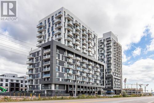 203 - 345 Wheat Boom Drive, Oakville, ON - Outdoor With Balcony With Facade