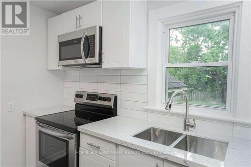 23 Hazel Street, St. Catharines, ON - Indoor Photo Showing Kitchen With Double Sink