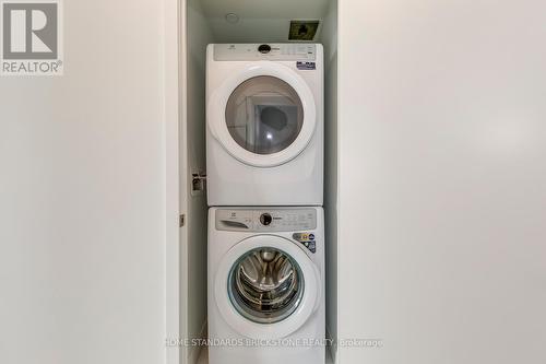 N2304 - 7 Golden Lion Heights, Toronto, ON - Indoor Photo Showing Laundry Room