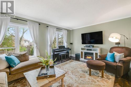 754 Roseheath Drive, Milton, ON - Indoor Photo Showing Living Room With Fireplace