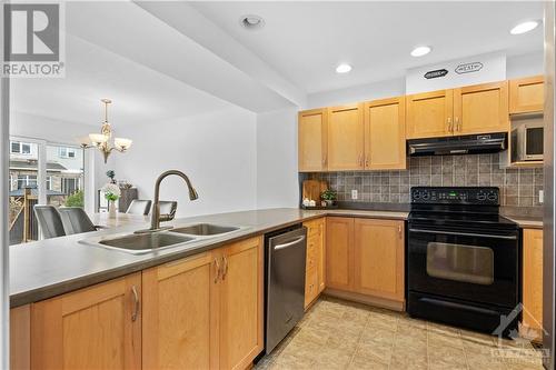 450 Grey Seal Circle, Ottawa, ON - Indoor Photo Showing Kitchen With Double Sink