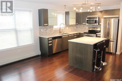 202 1510 Neville Drive, Regina, SK - Indoor Photo Showing Kitchen With Stainless Steel Kitchen With Upgraded Kitchen