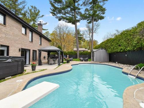 Backyard - 25 Av. De Colombey, Lorraine, QC - Outdoor With In Ground Pool With Deck Patio Veranda With Backyard