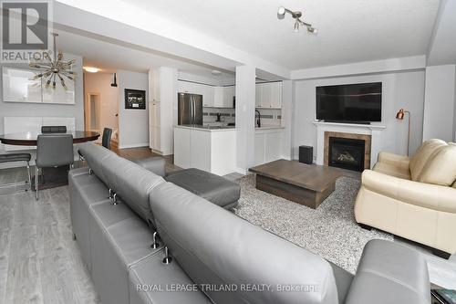6550 Raleigh Boulevard, London, ON - Indoor Photo Showing Living Room With Fireplace