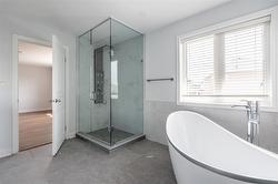 ENSUITE WITH STAND ALONE TUB AND SEPARATE SHOWER - 