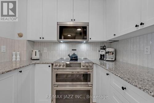 202 - 80 Shipway Avenue, Clarington, ON - Indoor Photo Showing Kitchen With Upgraded Kitchen