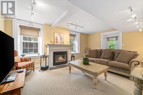 8 Bridge Street, Prince Edward County, ON - Indoor Photo Showing Living Room With Fireplace