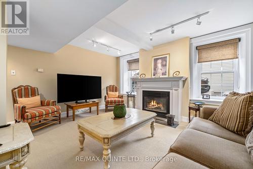 8 Bridge Street, Prince Edward County, ON - Indoor Photo Showing Living Room With Fireplace