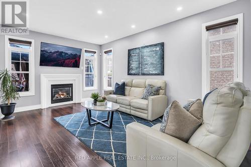 822 Miller Park Avenue, Bradford West Gwillimbury, ON - Indoor Photo Showing Living Room With Fireplace
