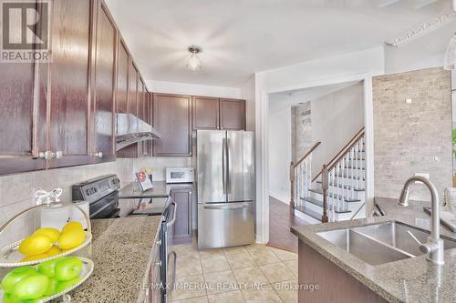 11 Silkgrove Terrace N, Markham, ON - Indoor Photo Showing Kitchen With Double Sink