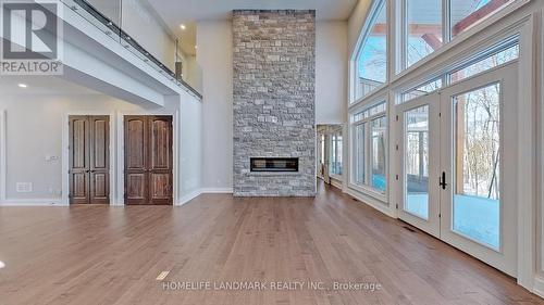 11 Warbler Way, Oro-Medonte, ON - Indoor Photo Showing Other Room With Fireplace