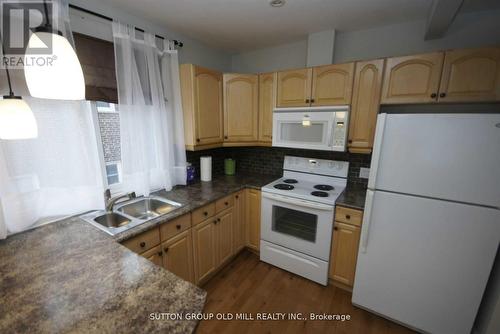 112 Stephen Drive, Toronto (Stonegate-Queensway), ON - Indoor Photo Showing Kitchen With Double Sink