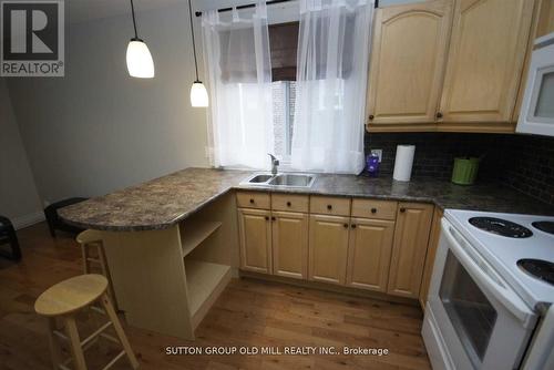 112 Stephen Drive, Toronto (Stonegate-Queensway), ON - Indoor Photo Showing Kitchen With Double Sink